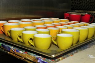 Produktion von Werbe - MUGS GmbH