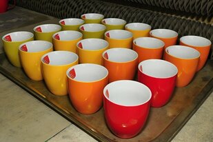 Produktion von Werbe - MUGS GmbH